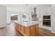 Modern kitchen with island, stainless steel appliances, and white cabinets at 22837 E Alyssa Rd, Queen Creek, AZ 85142