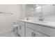 Double sink vanity featuring modern fixtures and updated cabinets at 7453 S 75Th Dr, Laveen, AZ 85339