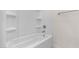 Clean white bathtub with modern fixtures and a built-in shower head at 7453 S 75Th Dr, Laveen, AZ 85339