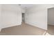 Spacious empty bedroom with neutral carpet and plenty of natural light at 7453 S 75Th Dr, Laveen, AZ 85339