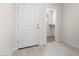 Hallway view of front door and closet at 7453 S 75Th Dr, Laveen, AZ 85339