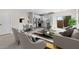 Open-concept living room featuring seating, dining area and kitchen at 7453 S 75Th Dr, Laveen, AZ 85339