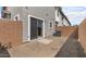 This is a small, gravel-filled patio that backs up to the property next door at 7453 S 75Th Dr, Laveen, AZ 85339