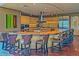 Modern community kitchen with curved bar seating at 3730 E Cat Balue Dr, Phoenix, AZ 85050