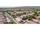 Community aerial, lush landscaping, single-Gathering homes and neighborhood streets create inviting vibrant community at 17552 W Young St, Surprise, AZ 85388