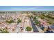 A vibrant neighborhood featuring well-maintained homes, tree-lined streets and a peaceful residential atmosphere at 17552 W Young St, Surprise, AZ 85388