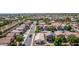 Community aerial view, lush landscaping, single-Gathering homes and neighborhood streets in this vibrant community at 17552 W Young St, Surprise, AZ 85388