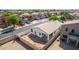 A charming backyard with a patio and block fence, perfect for relaxation and outdoor gatherings at 17552 W Young St, Surprise, AZ 85388