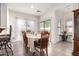 Bright dining area with a table and seating for six, complemented by natural light at 17552 W Young St, Surprise, AZ 85388