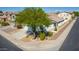 Aerial view of a home with desert landscaping, a driveway, and a two-car garage at 17552 W Young St, Surprise, AZ 85388