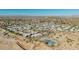 Community aerial view showcases the layout and surrounding desert landscape at 2233 E Behrend Dr # 210, Phoenix, AZ 85024