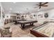 Versatile game room with pool tables and shuffleboard offers an engaging and social recreational space at 2233 E Behrend Dr # 210, Phoenix, AZ 85024