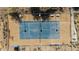 Aerial view of community tennis court with desert mountain views at 2233 E Behrend Dr # 210, Phoenix, AZ 85024