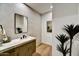 Modern bathroom with patterned tile and sleek vanity at 9930 E Miramonte Dr, Scottsdale, AZ 85262