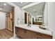 Elegant bathroom with a large vanity and walk-in closet at 9930 E Miramonte Dr, Scottsdale, AZ 85262