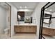 Modern bathroom with floating vanity and large mirror at 9930 E Miramonte Dr, Scottsdale, AZ 85262