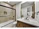 Clean bathroom with a tub shower combo and modern vanity at 9930 E Miramonte Dr, Scottsdale, AZ 85262