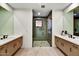 Double vanity bathroom with a walk-in shower at 9930 E Miramonte Dr, Scottsdale, AZ 85262