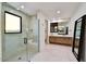 Spa-like bathroom with walk-in shower and dual vanity at 9930 E Miramonte Dr, Scottsdale, AZ 85262