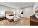 Spacious bedroom with a king-size bed and light flooring at 9930 E Miramonte Dr, Scottsdale, AZ 85262