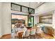 Elegant dining area with sliding doors leading to the outdoor patio at 9930 E Miramonte Dr, Scottsdale, AZ 85262