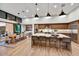 Modern kitchen with large island and stainless steel appliances at 9930 E Miramonte Dr, Scottsdale, AZ 85262