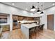 Modern kitchen with large island and stainless steel appliances at 9930 E Miramonte Dr, Scottsdale, AZ 85262