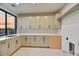 Laundry room with ample counter and cabinet space at 9930 E Miramonte Dr, Scottsdale, AZ 85262