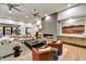 Spacious living room with fireplace and comfortable seating at 9930 E Miramonte Dr, Scottsdale, AZ 85262