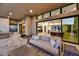 Spacious patio with comfortable seating and views of the living room at 9930 E Miramonte Dr, Scottsdale, AZ 85262