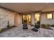 Relaxing patio with seating and views of the backyard at 9930 E Miramonte Dr, Scottsdale, AZ 85262