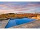 Stunning pool with mountain views at sunset at 9930 E Miramonte Dr, Scottsdale, AZ 85262