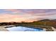 Luxury pool and patio with stunning sunset views at 9930 E Miramonte Dr, Scottsdale, AZ 85262