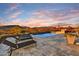 Inviting pool and spa with mountain views and lounge chairs at 9930 E Miramonte Dr, Scottsdale, AZ 85262