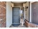 Front entry with a security door and a decorative planter at 19219 N 33Rd Ave, Phoenix, AZ 85027