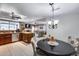 Kitchen features a breakfast nook and views into the living room at 19219 N 33Rd Ave, Phoenix, AZ 85027