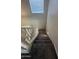 View of carpeted staircase leading to upper level at 310 S 113Th Dr, Avondale, AZ 85323