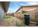 Practical backyard side view showcasing ample space, storage, and exterior features at 3425 W Acoma Dr, Phoenix, AZ 85053