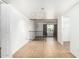 Inviting living room with tile flooring and a large window showcasing natural light at 3425 W Acoma Dr, Phoenix, AZ 85053