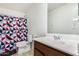 Clean bathroom with a shower/tub combo and vanity at 25677 W Siesta Way, Buckeye, AZ 85326