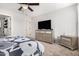 Spacious bedroom with dresser, TV, and additional closet space at 25677 W Siesta Way, Buckeye, AZ 85326