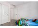 bedroom with a single bed and built-in closet at 25677 W Siesta Way, Buckeye, AZ 85326