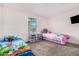 Bright bedroom with two beds and ample closet space at 25677 W Siesta Way, Buckeye, AZ 85326