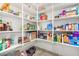Well-stocked pantry with ample shelving for storage at 25677 W Siesta Way, Buckeye, AZ 85326