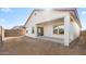 A spacious backyard featuring a covered patio that provides great shade at 7552 W Park St, Laveen, AZ 85339