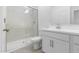 Bathroom featuring a glass shower and white vanity with modern fixtures at 7552 W Park St, Laveen, AZ 85339