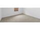 Bedroom featuring neutral carpet, paint and baseboards at 7552 W Park St, Laveen, AZ 85339