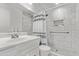 Clean bathroom with white marble tile, new shower, and modern sink at 728 W Grove Cir, Mesa, AZ 85210