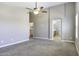 Spacious bedroom with neutral walls, soft carpet, and ensuite access at 786 W Jahns Dr, Casa Grande, AZ 85122
