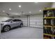Spacious three car garage with epoxy floors and ample storage and work space at 786 W Jahns Dr, Casa Grande, AZ 85122